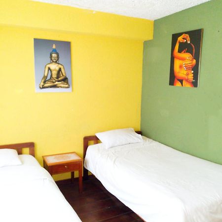 באניוס Hostal Inti Raymi Backpackers מראה חיצוני תמונה
