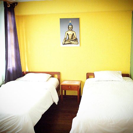 באניוס Hostal Inti Raymi Backpackers מראה חיצוני תמונה