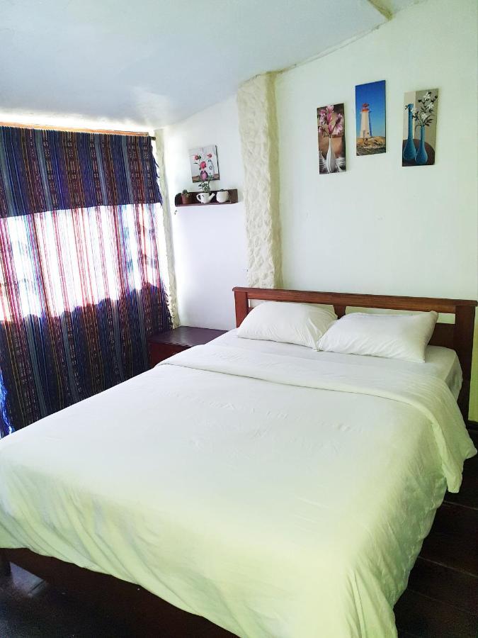 באניוס Hostal Inti Raymi Backpackers מראה חיצוני תמונה