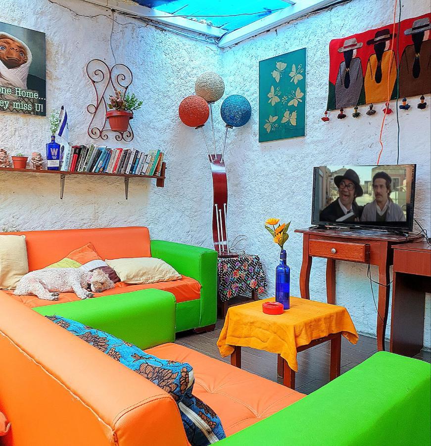 באניוס Hostal Inti Raymi Backpackers מראה חיצוני תמונה