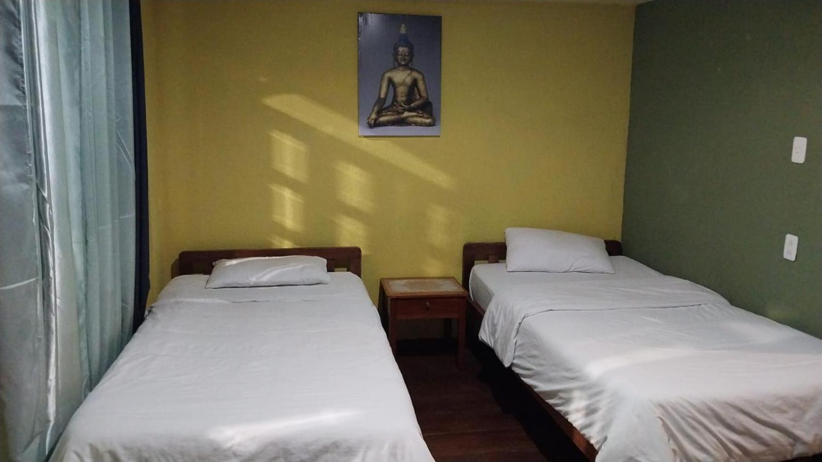 באניוס Hostal Inti Raymi Backpackers מראה חיצוני תמונה