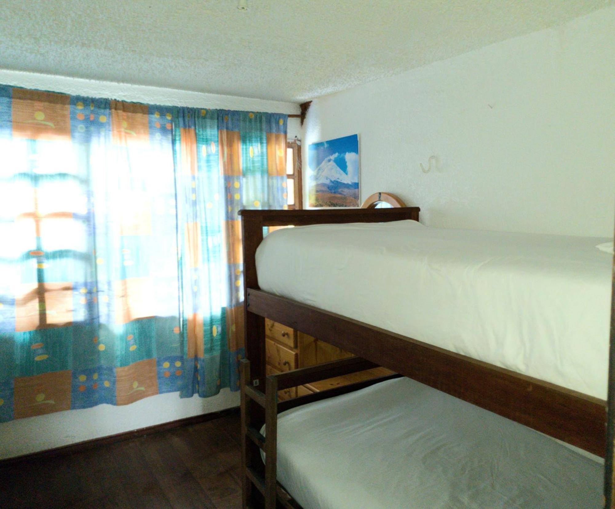 באניוס Hostal Inti Raymi Backpackers מראה חיצוני תמונה
