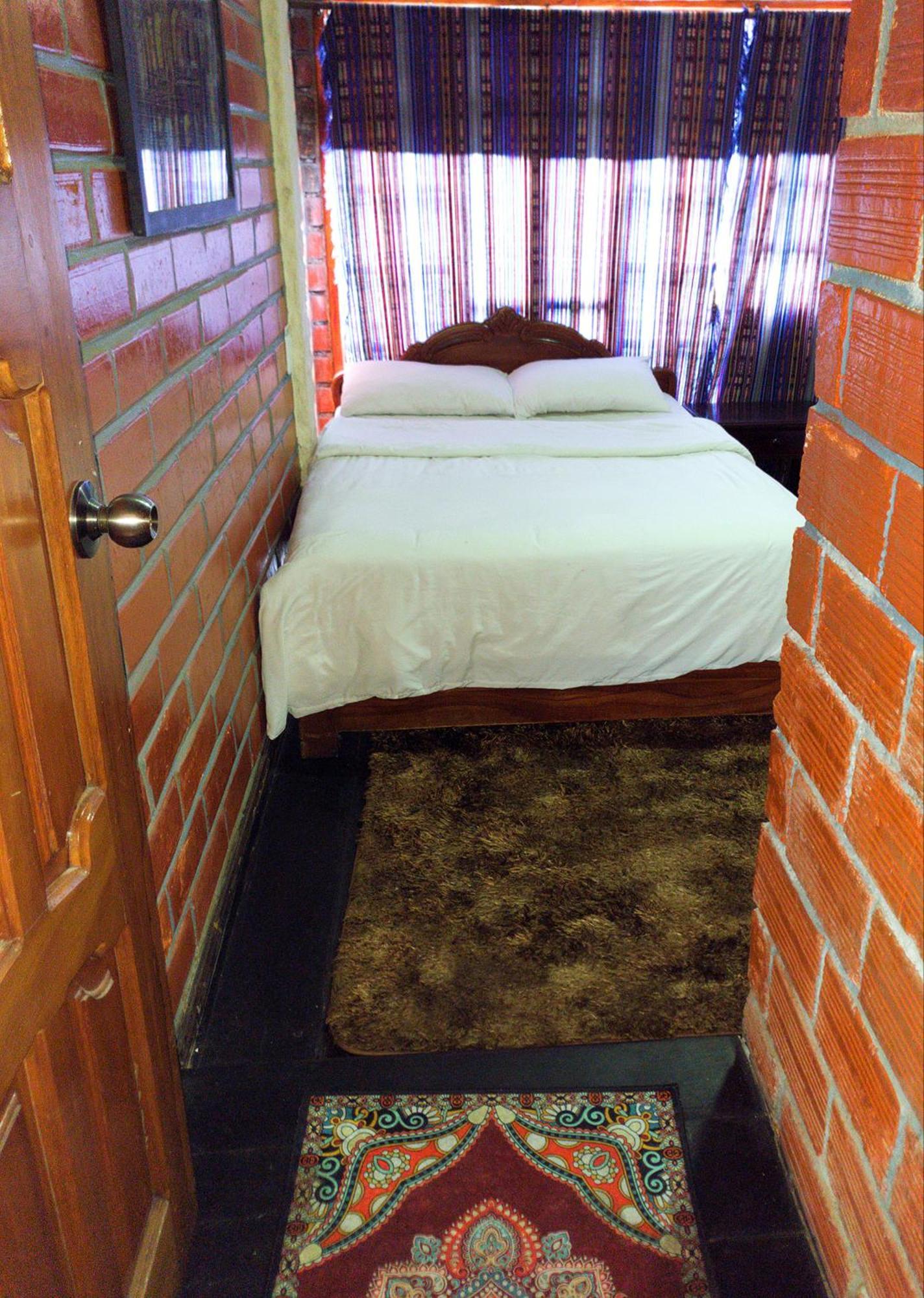 באניוס Hostal Inti Raymi Backpackers מראה חיצוני תמונה
