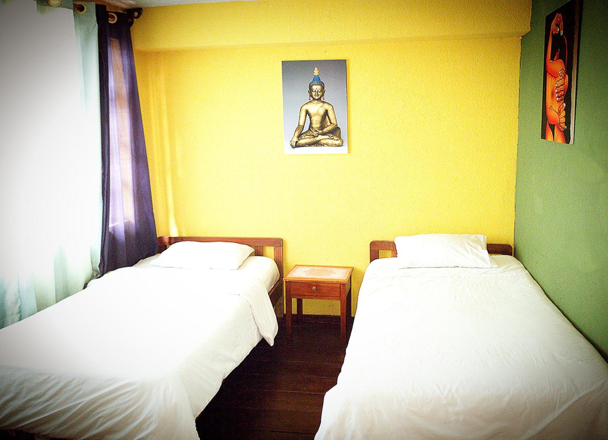 באניוס Hostal Inti Raymi Backpackers מראה חיצוני תמונה